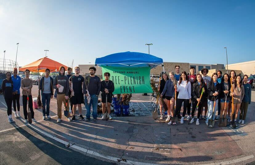 Volunteers planting trees at a Tree-Plenish event